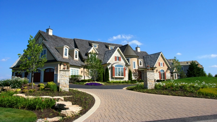 A McMansion: My house is nothing like this, but when you Google "McMansion" you get images like this. Houses that are way too big and would cost a fortune. You can kiss early retirement goodbye if you're building/buying one of these.